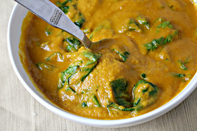 nutty sweet potato soup with harissa and spinach