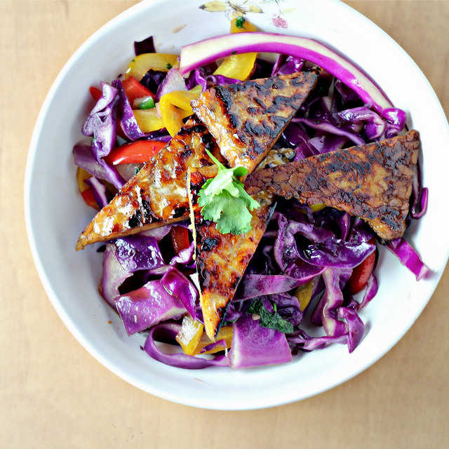 star anise-glazed tempeh with stir-fried peppers