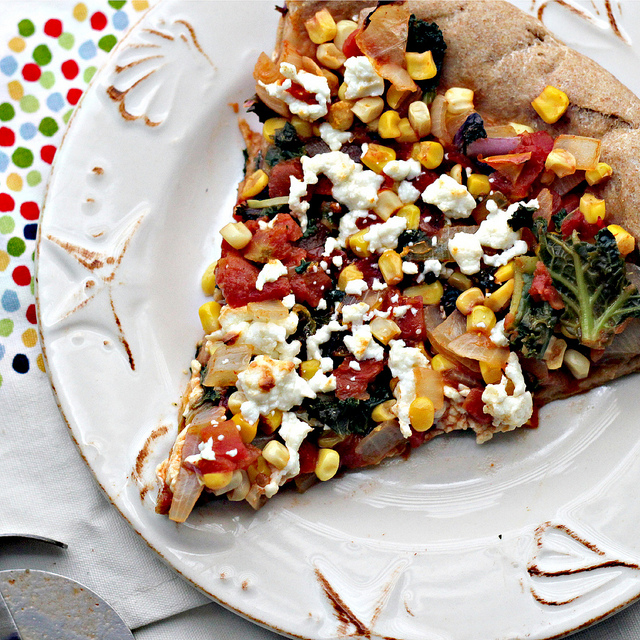 mexican pizza with kale, queso and a chipotle-tomato sauce