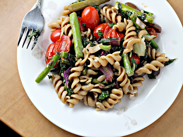 roasted asparagus and tomato pasta salad with goat cheese