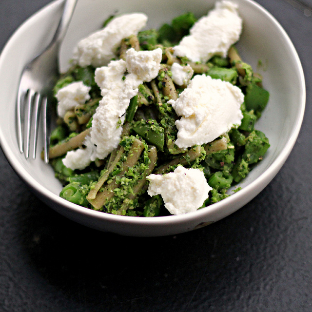 pasta with garlic scapes pesto, sugar snap peas and ricotta