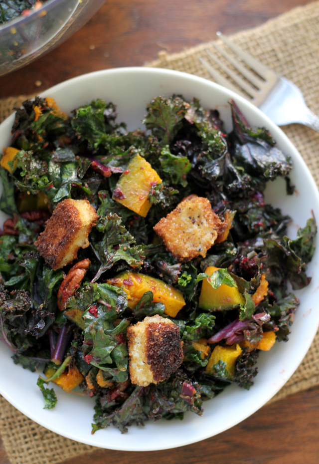 kale salad with brie croutons, roasted butternut squash, cumin-spiced pecans and a cranberry vinaigrette