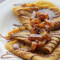 pumpkin crepes with beer and cinnamon apples and a chocolate drizzle