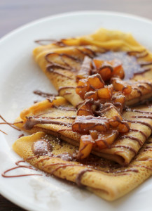 pumpkin crepes with beer and cinnamon apples and a chocolate drizzle