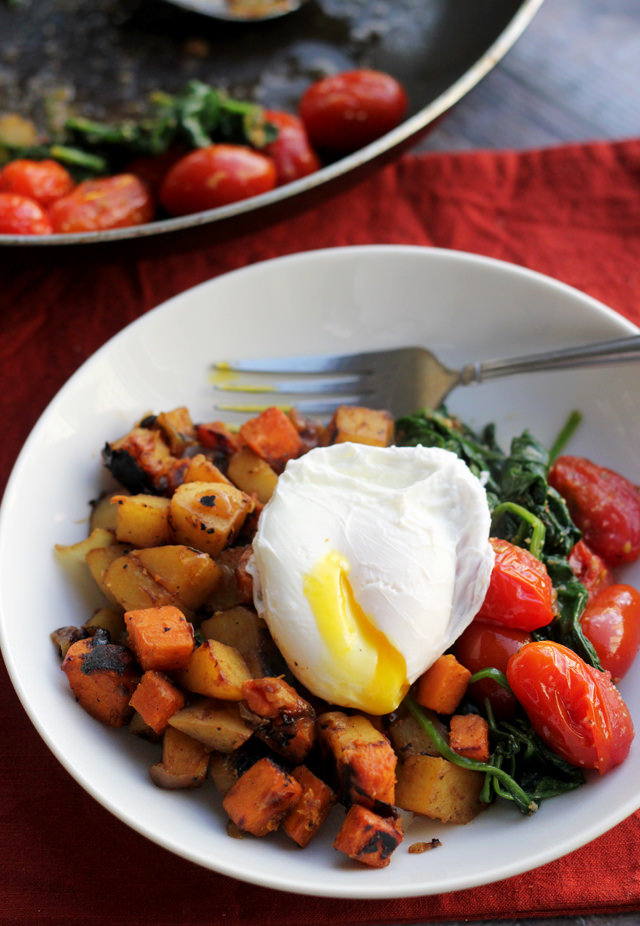 two-potato hash with poached eggs and greens
