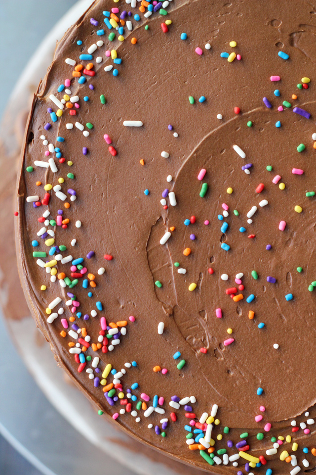 yellow birthday cake with fluffy chocolate ganache frosting