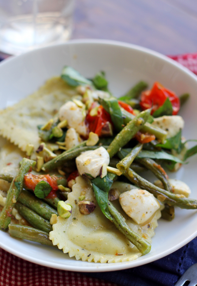 roasted string bean, tomato, basil, and mozzarella ravioli salad