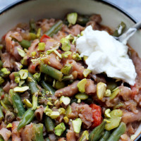 spiced fava bean soup with string beans and tomato