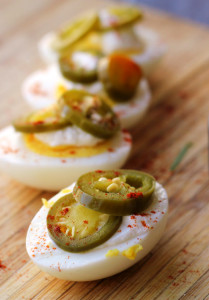 homemade quick-pickled jalapenos on hard boiled eggs