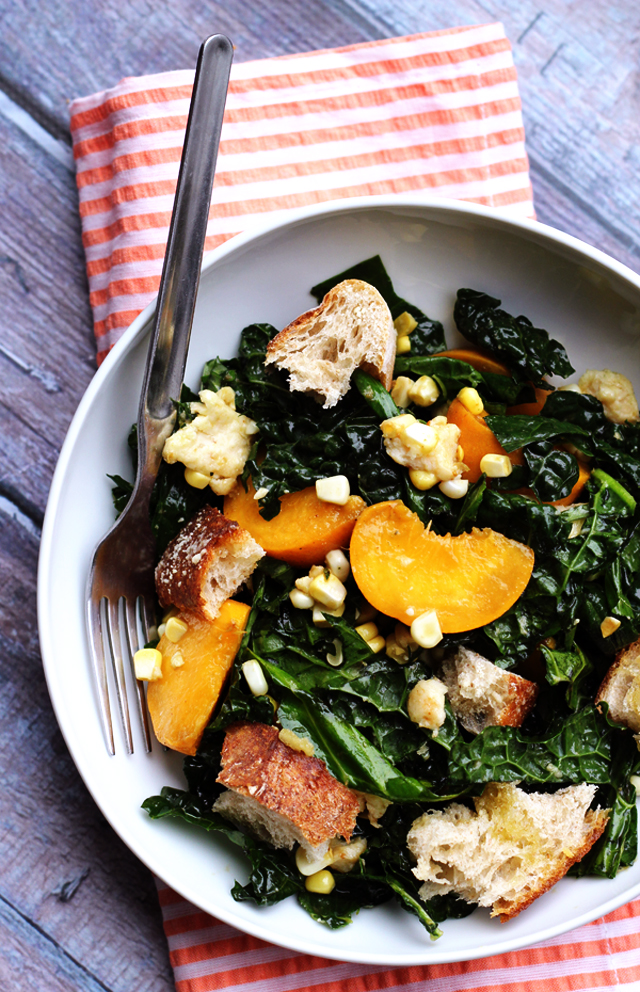 kale salad with peaches, corn, and honey-basil vinaigrette