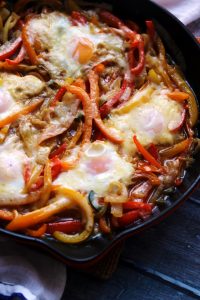 Beer-Baked Eggs with Peppers and Onions