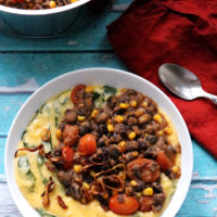 Braised Black Bean Stew with Cheesy Spinach Polenta and Fried Shallots