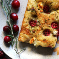 Cranberry Goat Cheese Focaccia with Rosemary Oil and a Honey Drizzle