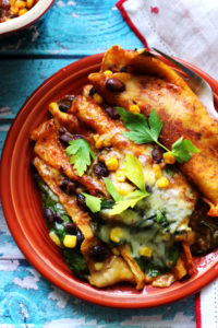 Vegetable Enchiladas with Black Beans, Corn, and Spinach