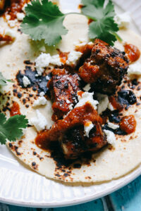 Salmon Tacos al Pastor with Goat Cheese and Smoky Tomatillo-Chipotle Salsa