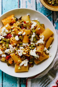 Pasta with Zucchini, Tomatoes, Pistachios, and Feta