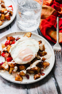 Roasted Mexican Potato Hash with Fried Eggs and Chipotle Crema
